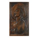 Thomas Symington Halliday (Scottish, 1902 - 1998), a carved oak portrait relief,