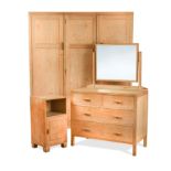 Attributed to Heal's, a limed oak part bedroom suite, circa 1930,