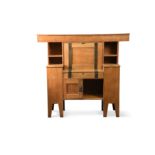 Leonard Wyburd (1865-1958) for Liberty & Co., an Arts & Crafts oak desk,