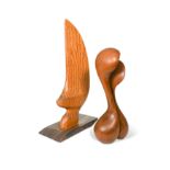 A satinwood carving in the form of a sail,