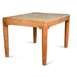 A Waring & Gillow Art Deco oak draw-leaf dining table,