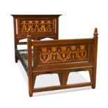 An Arts & Crafts single bed by Shapland & Petter,