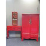 A red painted Chinese bedroom suit to include an adapted wardrobe to contain one central shelf
