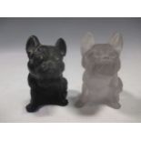 Two late 19th century French pressed glass models of French Bulldogs, one in black with green
