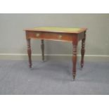 A William IV mahogany writing table with single frieze drawer over chamferred legs and brass cup
