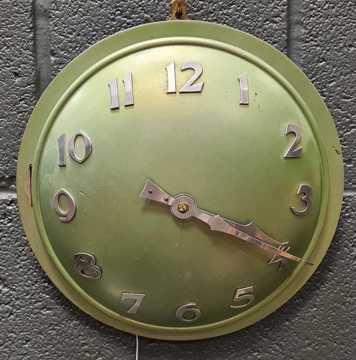 Four various electric wall clocks: including Sychronome slave with 19cm dial, mounted within