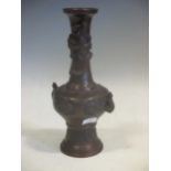 An Antique 19th century Japanese Meiji period bronze vase in high relief, 24cm high