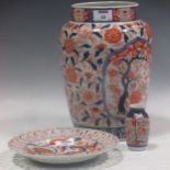 A Japanese Imari jar, together with a similar plate and a miniature vase (3)