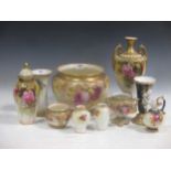 A collection of Royal Worcester and similar floral painted ceramics, some decorated with pink