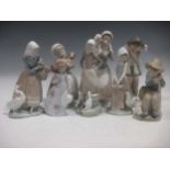 8 Lladro and Nao Spanish porcelain figures and a small Moorcroft bowl (9)