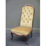 A Victorian rosewood nursing chair