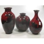 Three Royal Doulton flambe landscape vases, tallest 20cm high