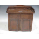 An apprentice cabinet with drawers and cupboards below, 26 x 27.5 x 19cmJuilians Park