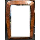 A rosewood frame arched top mirror, 59cm high