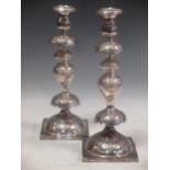 A pair of electroplate candlesticks 36cm high (2)
