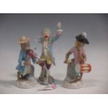 Three Continental porcelain monkey band figures, some damage