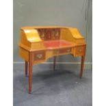 A 20th century satinwood Carlton House desk, made by the late Tom W. Skeels, 99 x 122 x 69cm