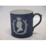A 1937 Wedgwood jasperware Edward VII mug together with two spode 1965 Churchill plates (Boxed)