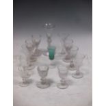 An air twist stem conical bowl glass and twelve other small mainy 19th century glasses