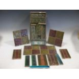 A collection of Craven Dunhill & Co floral decorated tiles and various other tiles (qty)