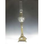 A brass mounted onyx column oil lamp 86cm high total
