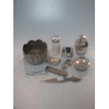 A collection of silver including 2 pill boxes, a letter opener, a match book cover, a powder bowl,