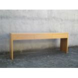 A modern ash console table with three drawers, 80 x 215 x 46cm