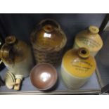 Two Barnsley Brewery Co Ltd part glazed stoneware flagons together with two other flagons, a