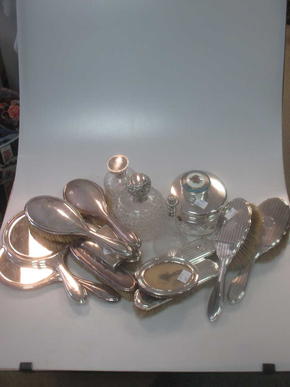 A collection of silverware including silver backed dressing table items, silver topped glass perfume - Image 2 of 2