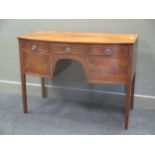 A George III mahogany bow front sideboard, 85 x 114 x 62cm together with a glazed mahogany bookcase,