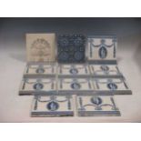 A group of Josiah Wedgwood & Sons Etruria blue and white tiles with classical deoration, together