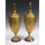 A pair of early 20th century gold coloured spelter lamps (2)