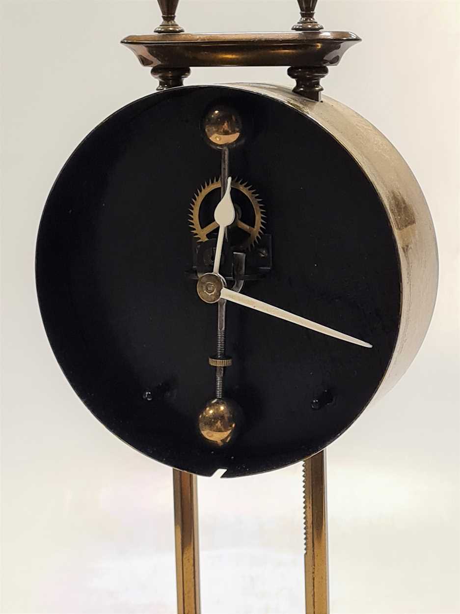 A British made gravity clock with 10cm dial, lacquered brass case on marble base, 26cm - Image 2 of 2