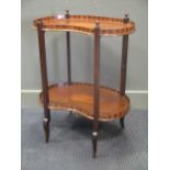 An inlaid mahogany two tier kidney shape stand, 76 x 58 x 37cm