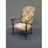 A French early 19th century carved walnut throne armchair