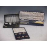 A box containing a large collection of silver plated ware including flatware, entree dishes,