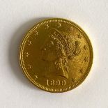 A United States of America $10 coin,