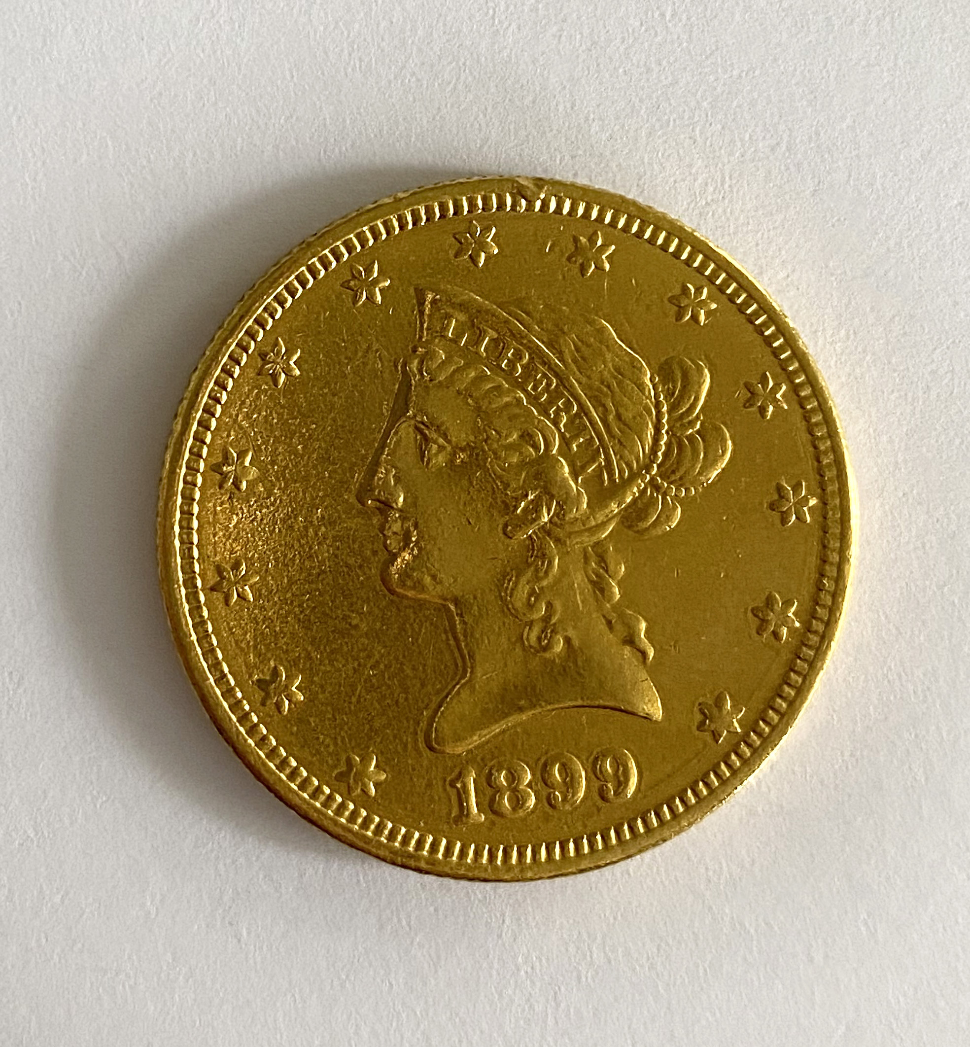 A United States of America $10 coin,