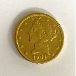 A United States of America $5 coin,