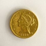 A United States of America $5 coin,