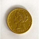 A United States of America $5 coin,