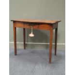 A mahogany serpentine shape side table with drawer, 19th Century. 73 x 88 x 46cm