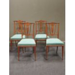 Four Edwardian rosewood side chairs by James Shoolbred