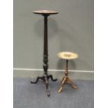 A modern brass standard lamp, a torchere and a reproduction wine table (3)