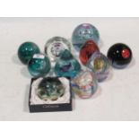 Ten Caithness glass paperweights, numbered limited editions