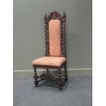 A set of three Victorian walnut dining chairs, and a carved high back hall chair in 17th century