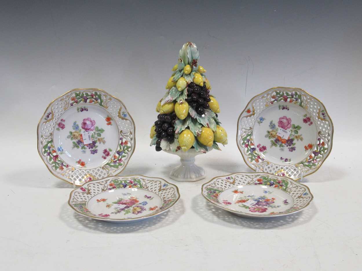 A set of four early 20th Century Dresden plates, a lemon tree ornanment, 2 lladrow figures, giraffe,