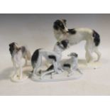A Stitzendorf model of a Borzoi, another, possibly Royal Dux and an American model (3)
