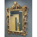 Carved giltwood Florentine style carved giltwood mirror, mirror