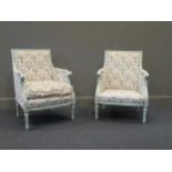 A pair of French style painted fauteuil armchairs